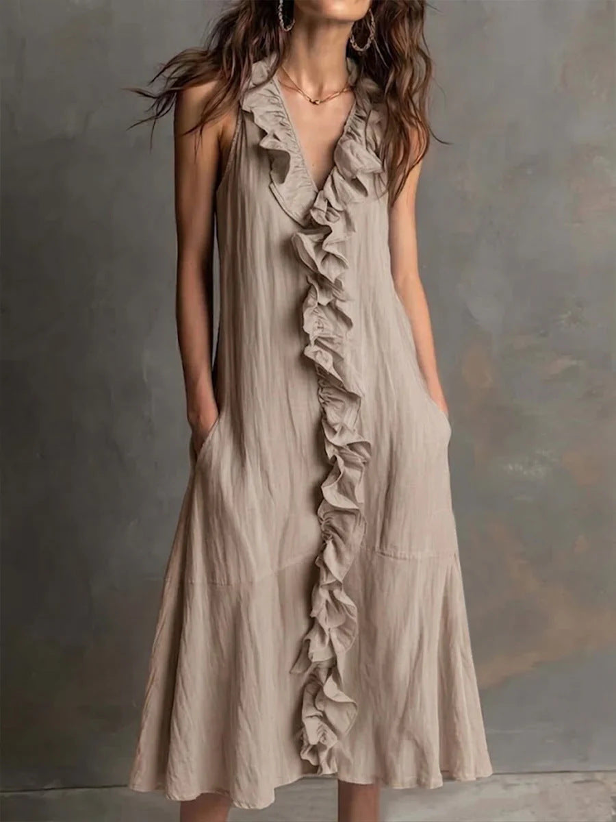 Vestido liso sin mangas con escote en pico y falda de vuelo con volantes