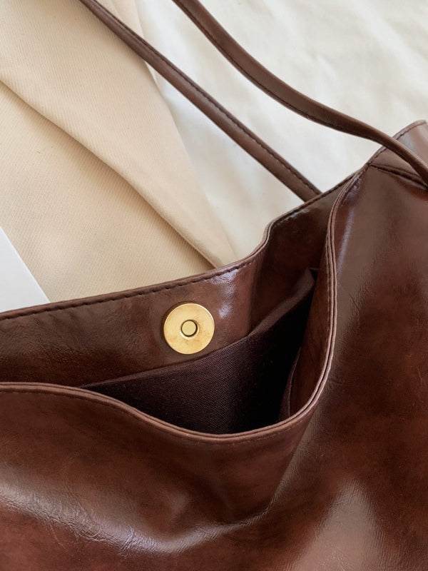 Bolso bucket de hombro grande de piel sintética suave