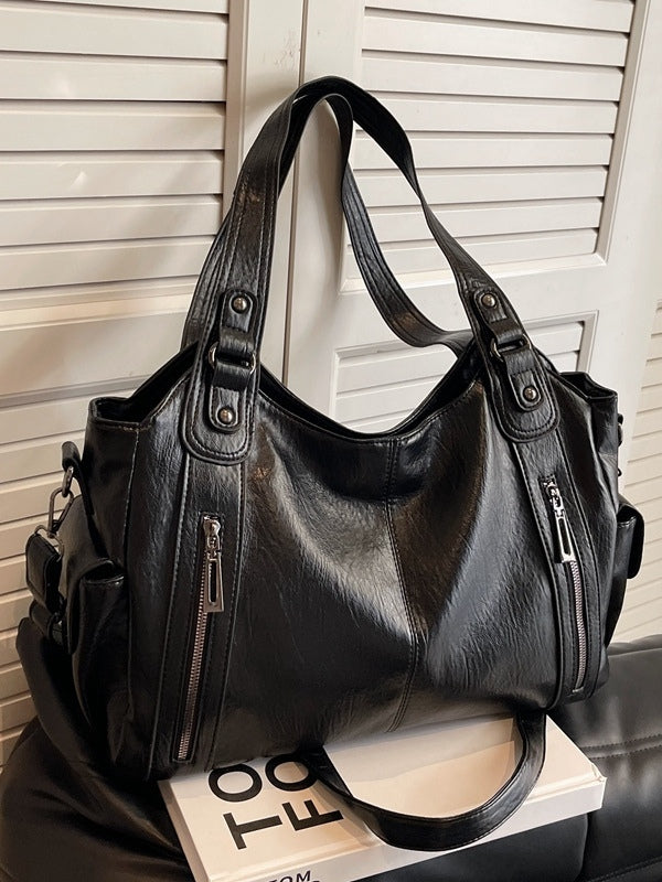 Bolso tote grande con remaches