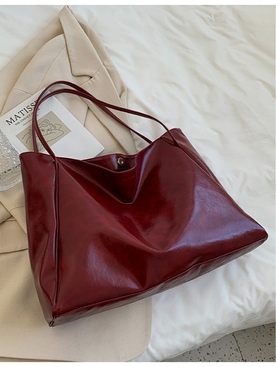 Bolso bucket de hombro grande de piel sintética suave