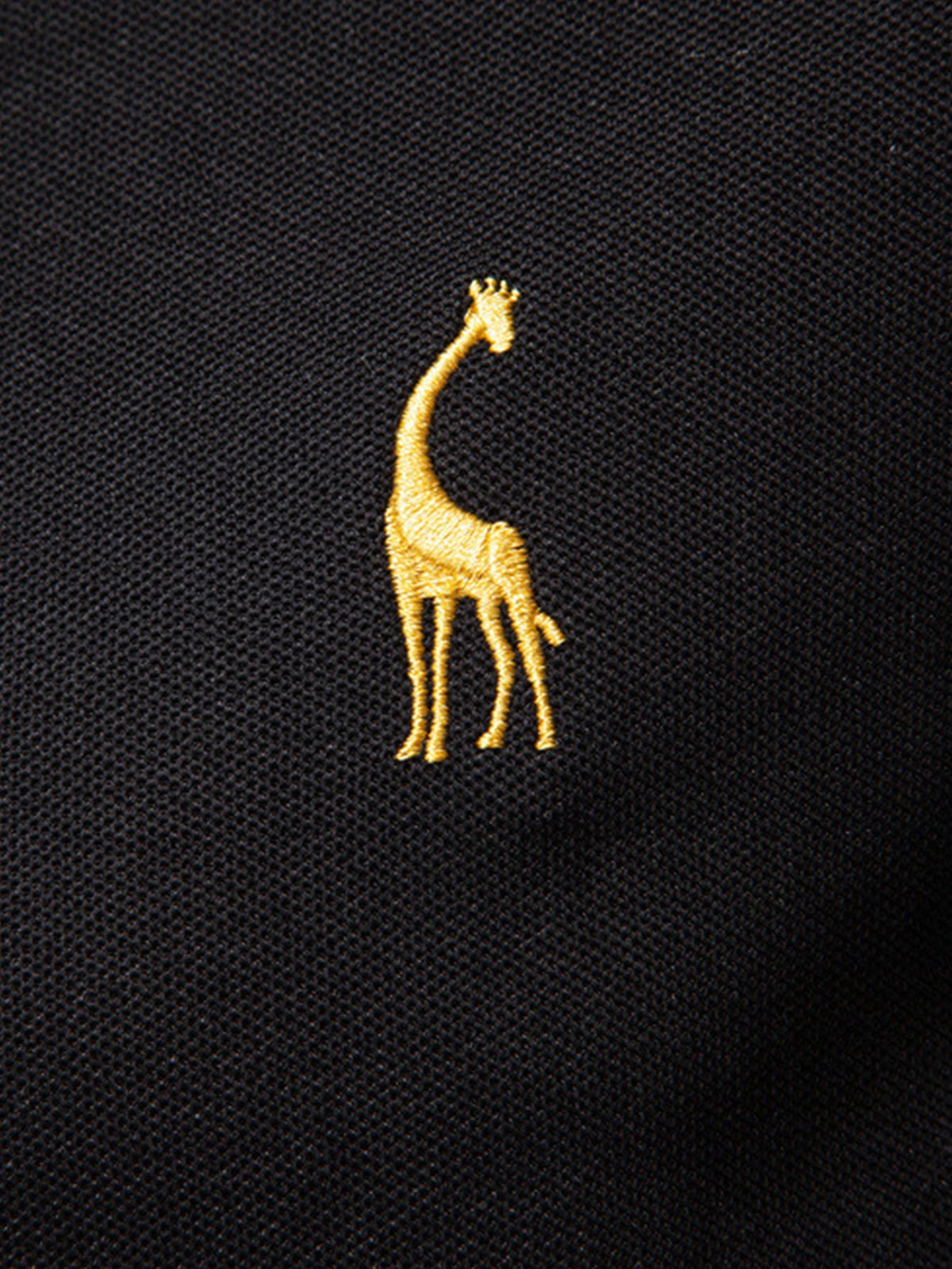 Polo de manga larga con bordado de jirafa