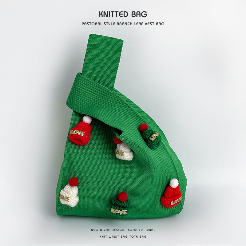 Bolso de punto artesanal con gorro navideño