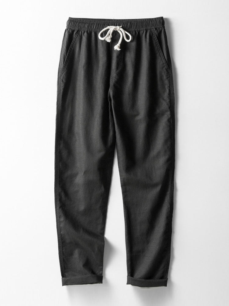 Camisa de punto abierta y pantalones de lino de pierna recta