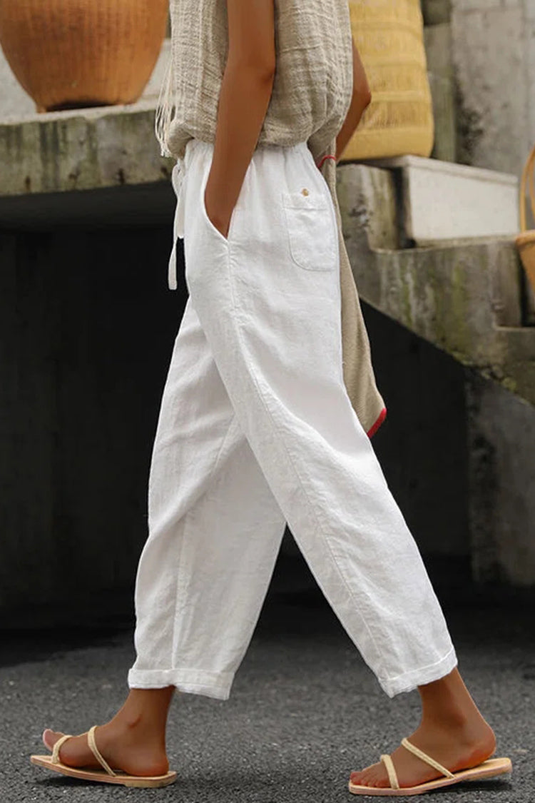 Pantalón casual holgado de algodón y lino con cordones, de color liso