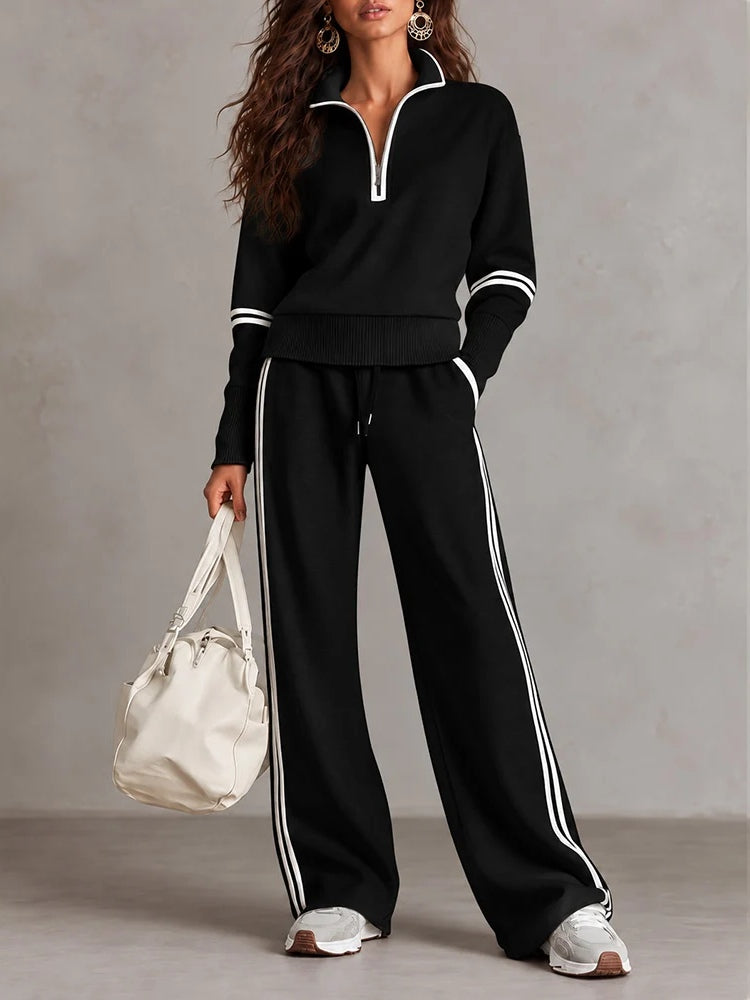 Conjunto de sudadera acanalada blanca con media cremallera y pantalón ancho con bloques de color