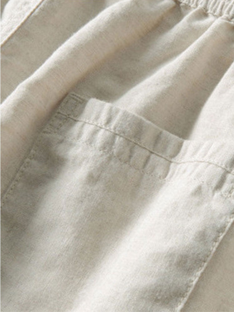 Camisa de punto abierta y pantalones de lino de pierna recta