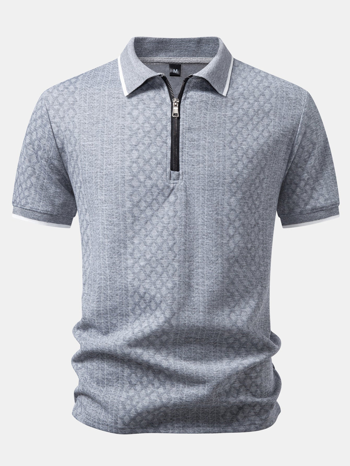 Polo de jacquard geométrico con cremallera