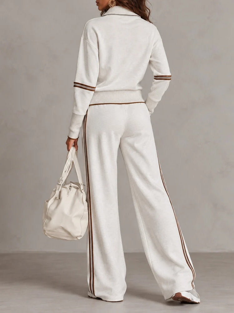 Conjunto de sudadera acanalada blanca con media cremallera y pantalón ancho con bloques de color