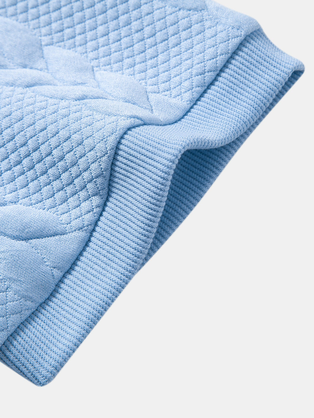 Polo de cuello en V de jacquard retorcido