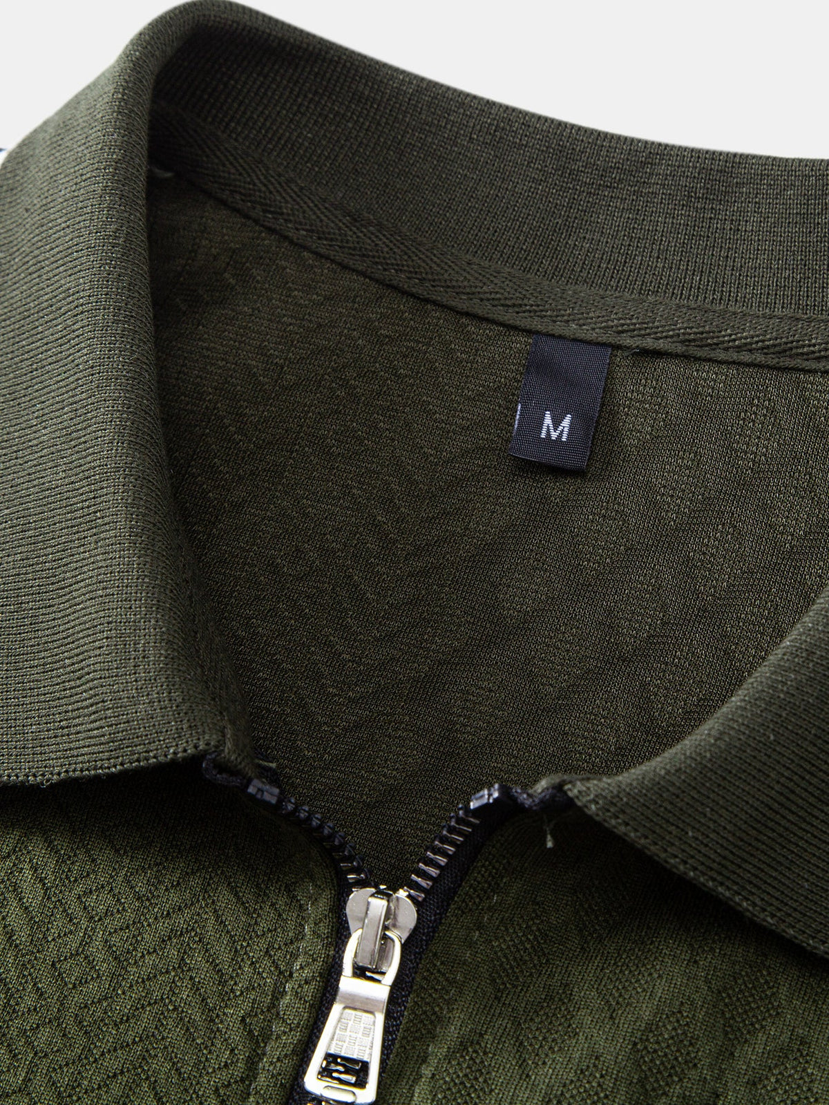 Polo de jacquard geométrico con cremallera