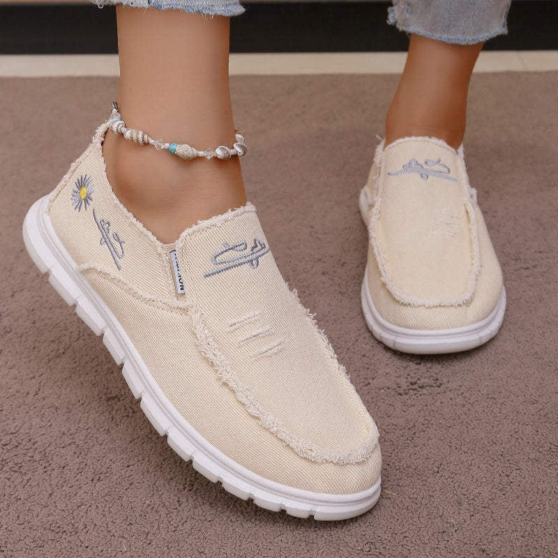 Mocasines de lona desgastada con bordado, sin cordones