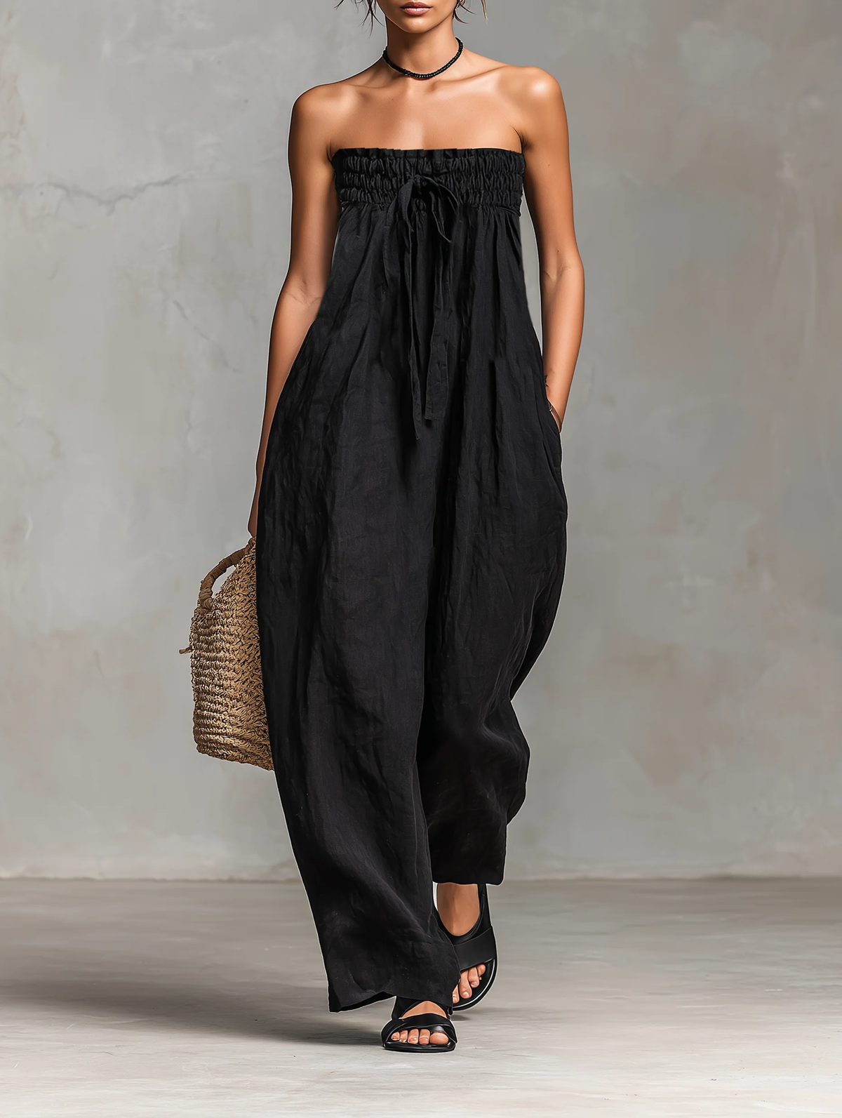 Mono negro minimalista holgado sin tirantes, efecto lino