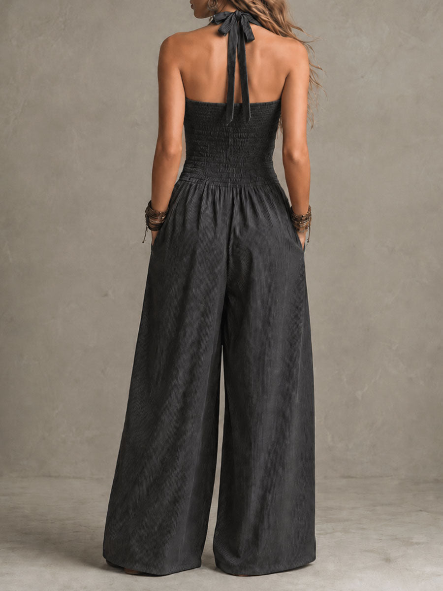 Mono bohemio gris marengo de raya diplomática, cuello halter y espalda cruzada