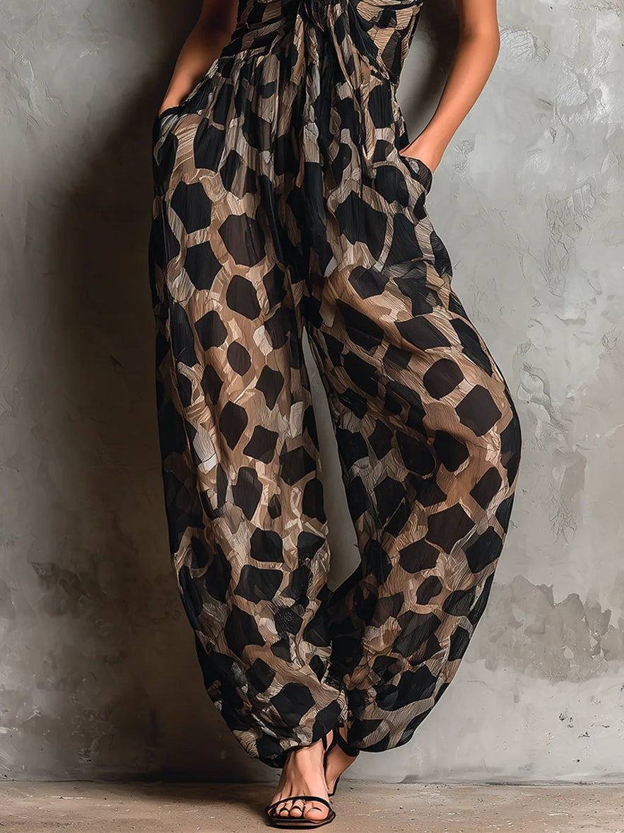 Mono negro de gasa holgado con estampado animal y cuello halter, pierna ancha