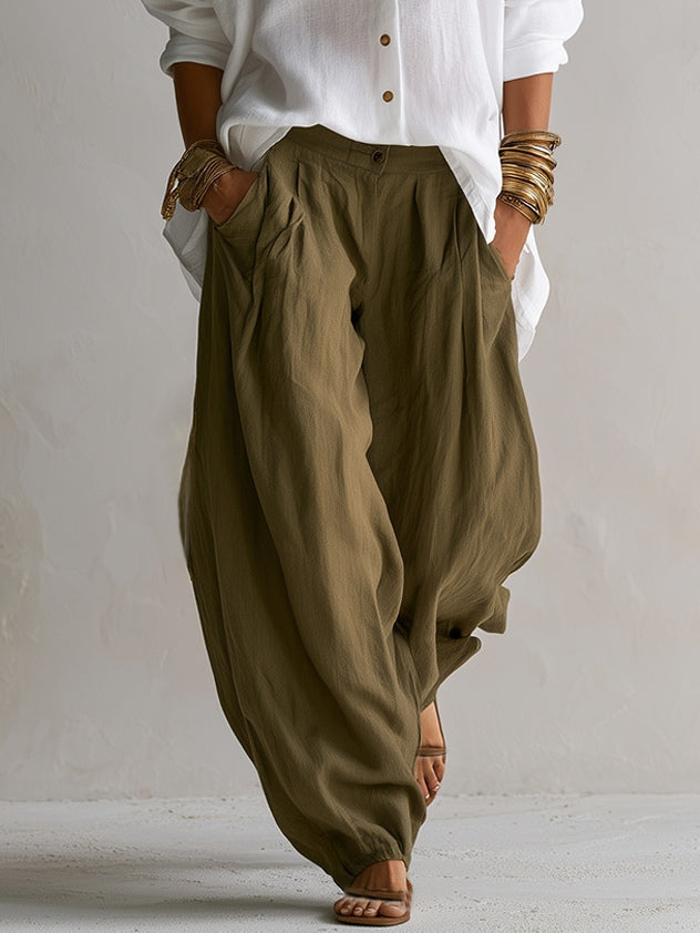 Conjunto de camisa blanca holgada y pantalón verde ancho tipo farol