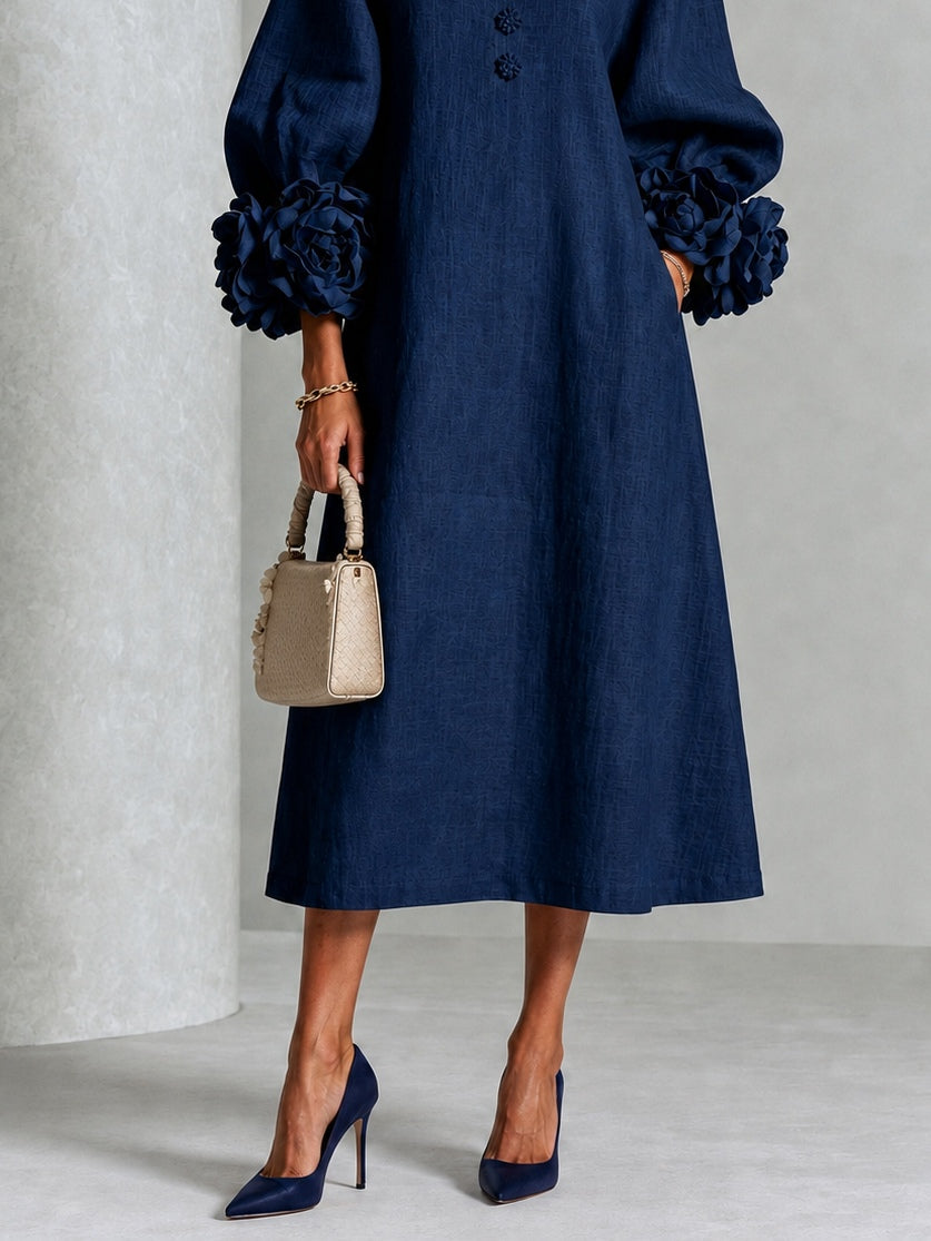 Vestido midi abotonado de flores en azul marino con puños de flores