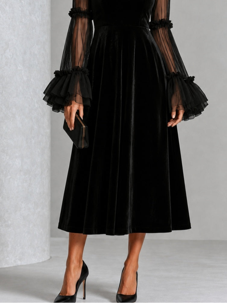 Vestido midi plisado negro de terciopelo y malla transparente