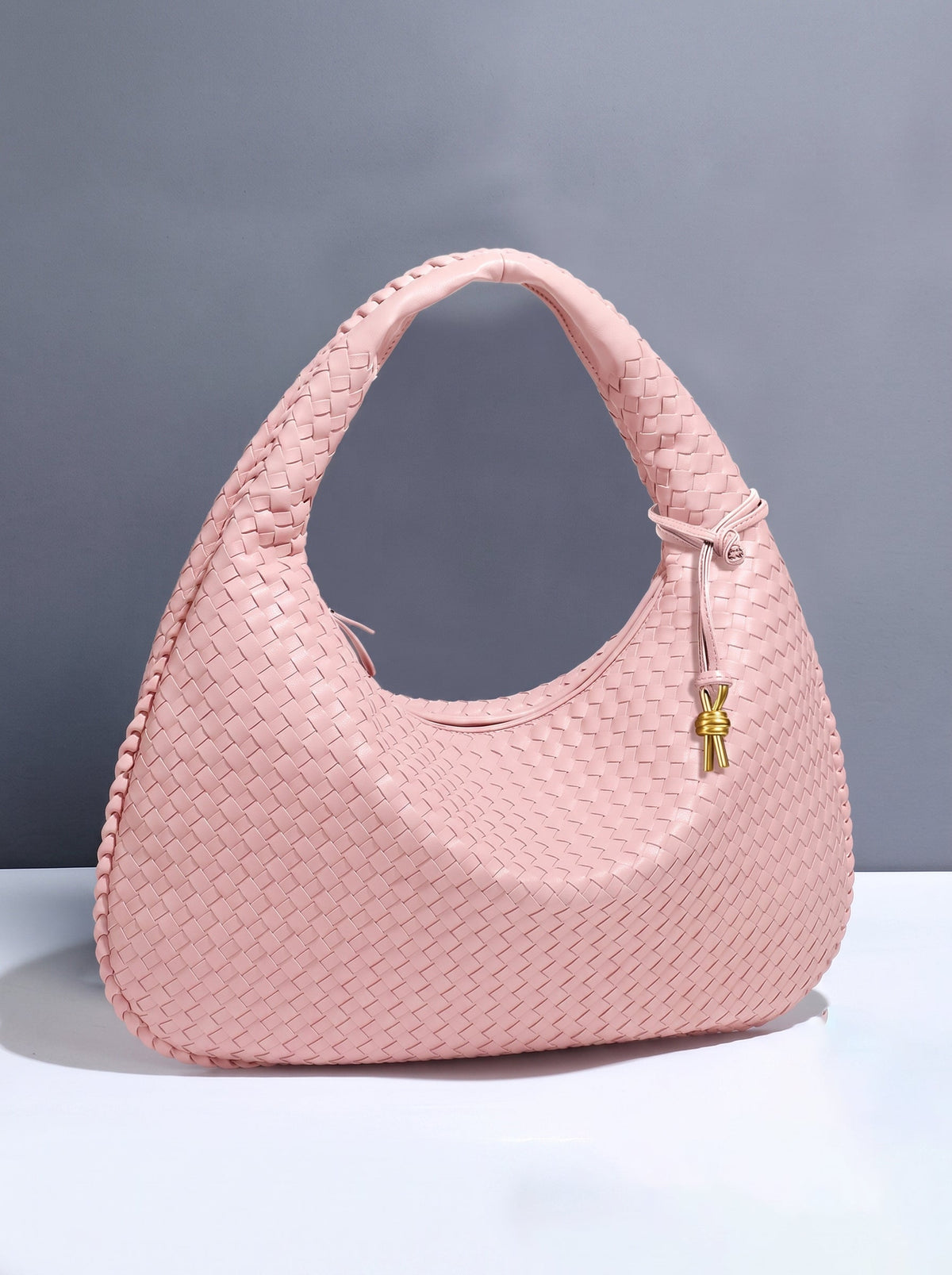 Bolso trenzado de piel sintética
