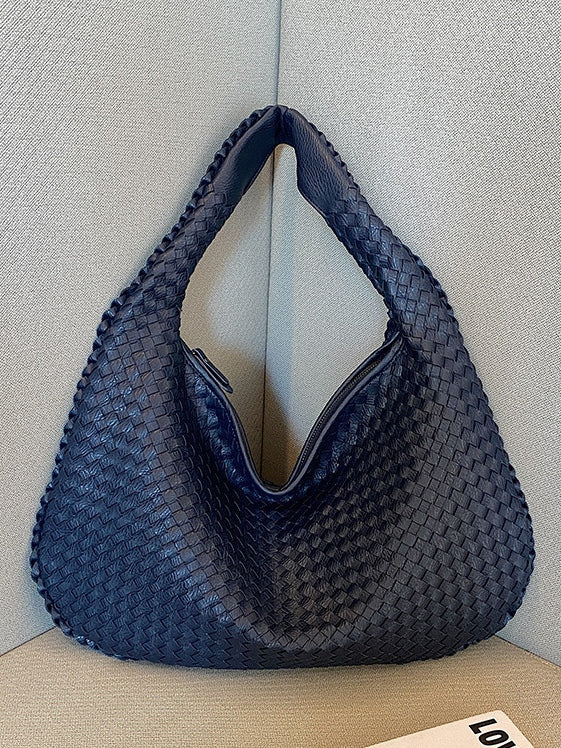 Bolso trenzado de piel sintética