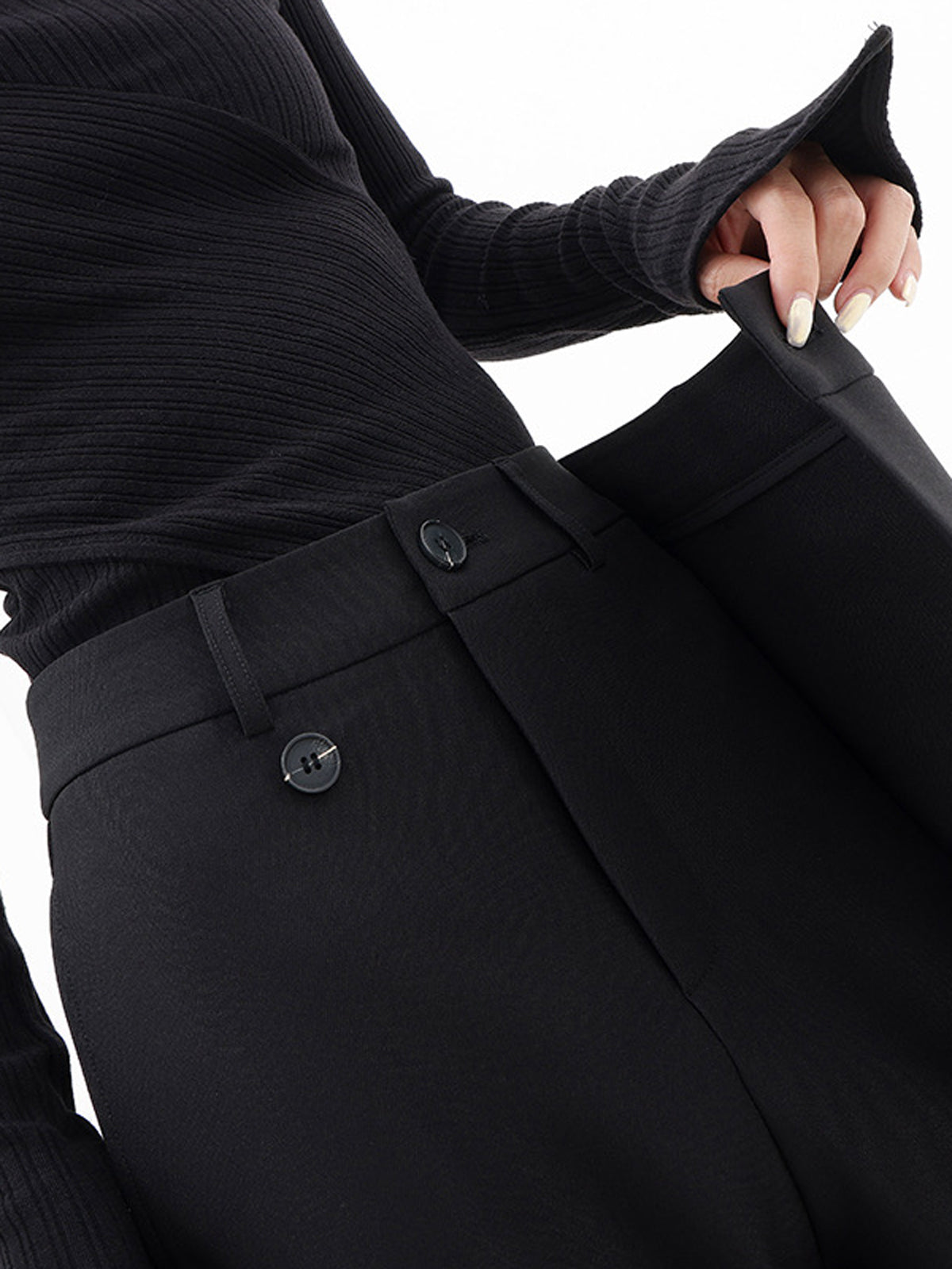 Pantalón ancho holgado asimétrico con capas y botones