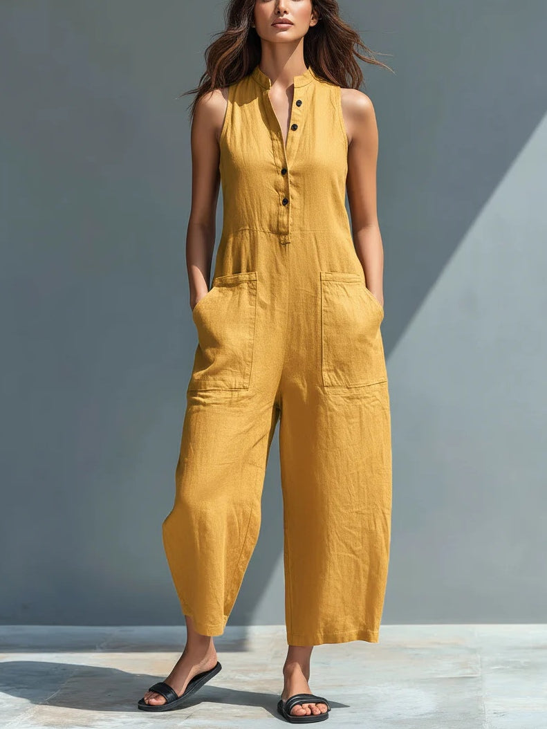 Mono negro minimalista efecto lino con cuello camisero, sin mangas y holgado