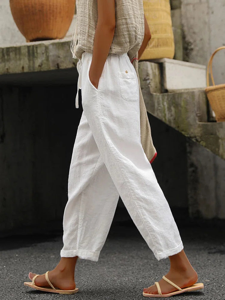 Pantalón casual holgado de algodón y lino con cordones, de color liso