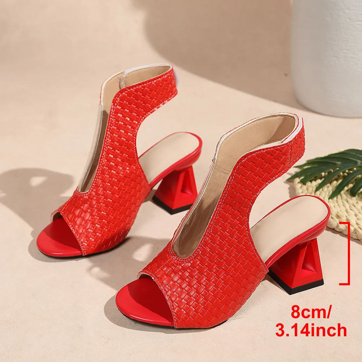 Mules tejidas de puntera abierta y tacón ancho de 8 cm