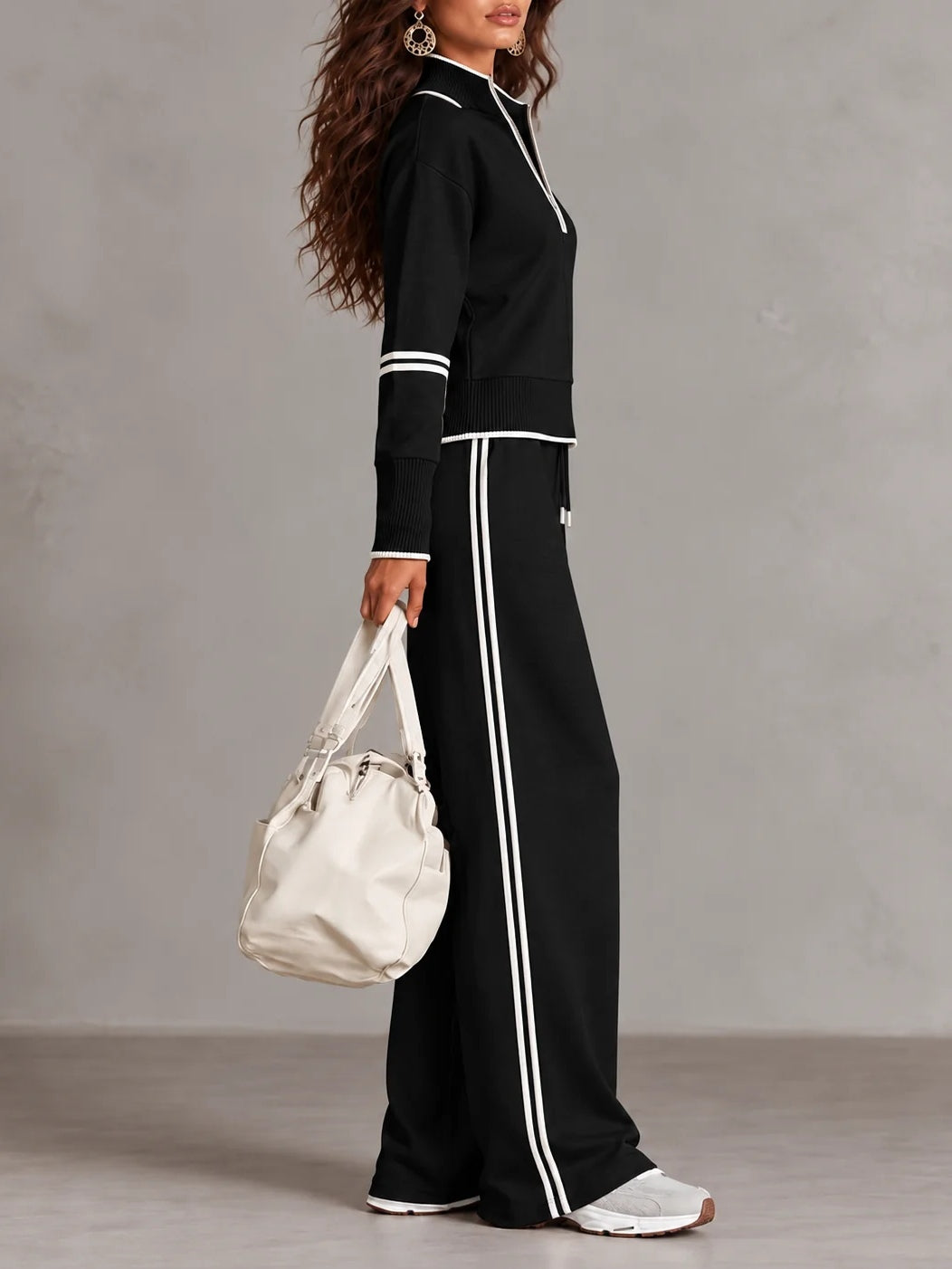 Conjunto de sudadera acanalada blanca con media cremallera y pantalón ancho con bloques de color