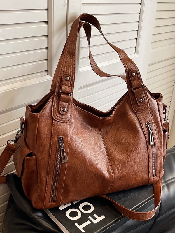 Bolso tote grande con remaches