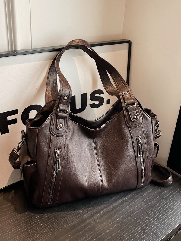 Bolso tote grande con remaches