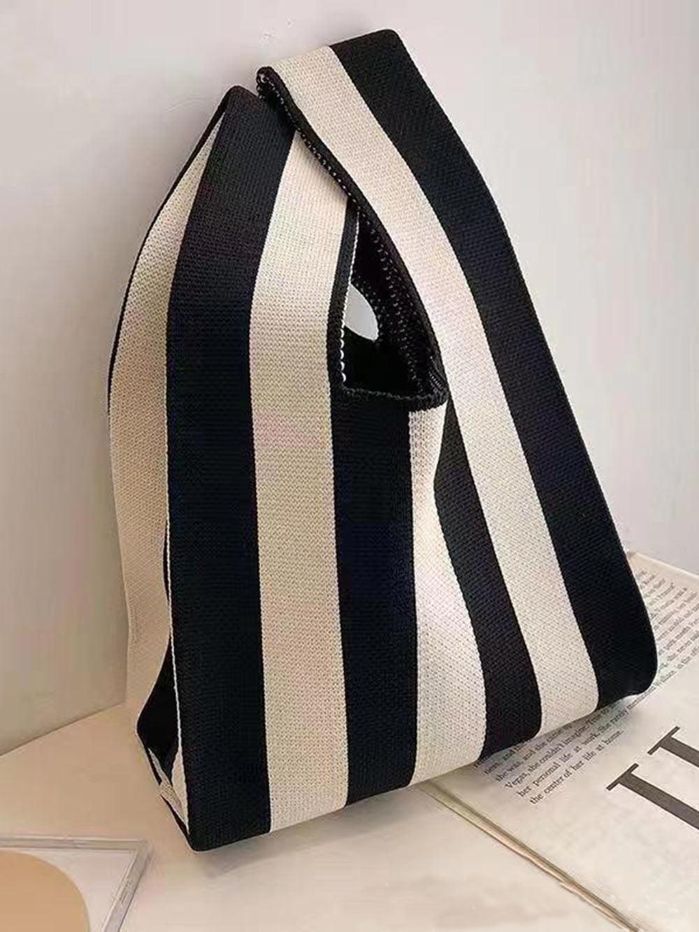 Bolso cubo de mano versátil
