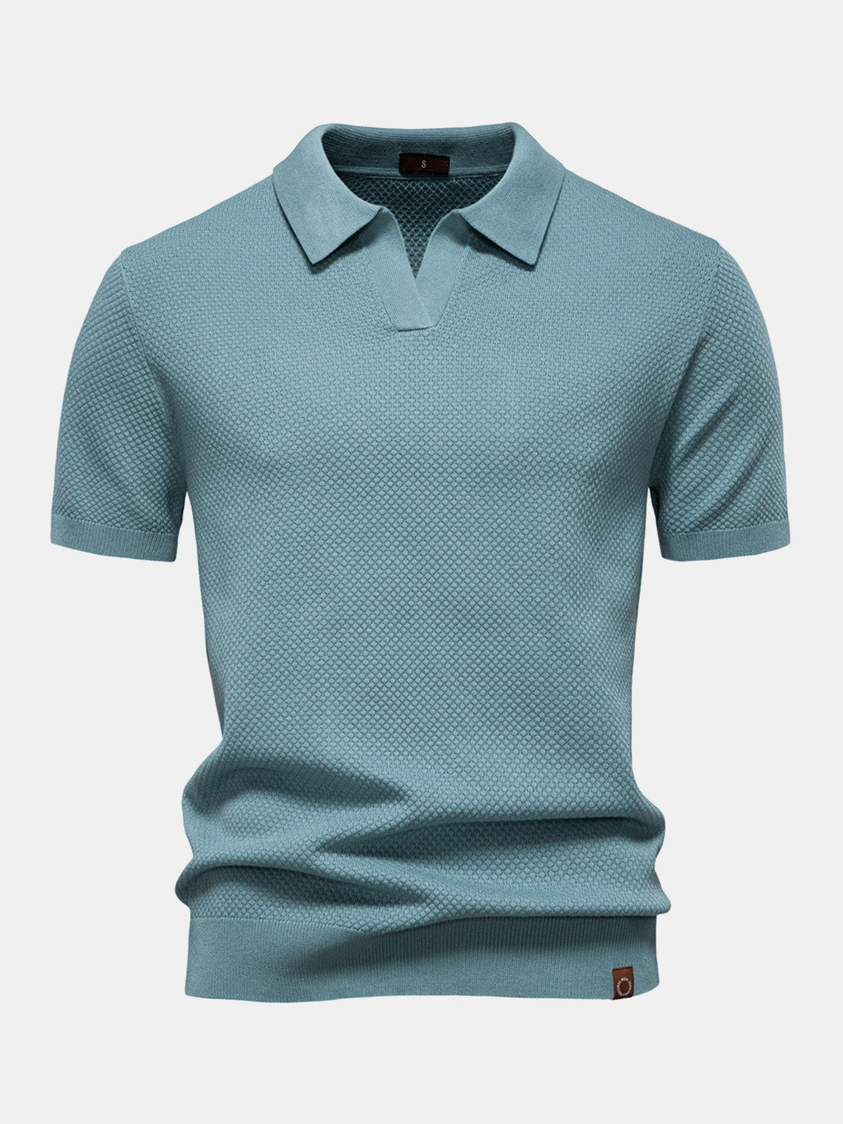 Polo de punto con textura de piña y cuello en V