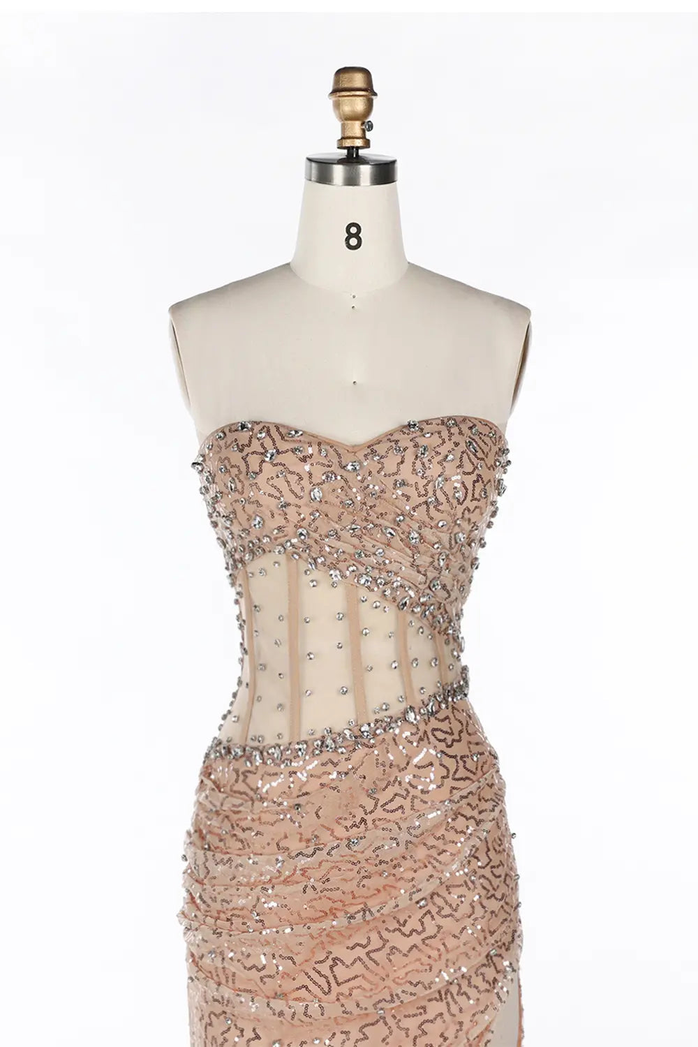 Vestido de noche champán con corsé, lentejuelas y abertura