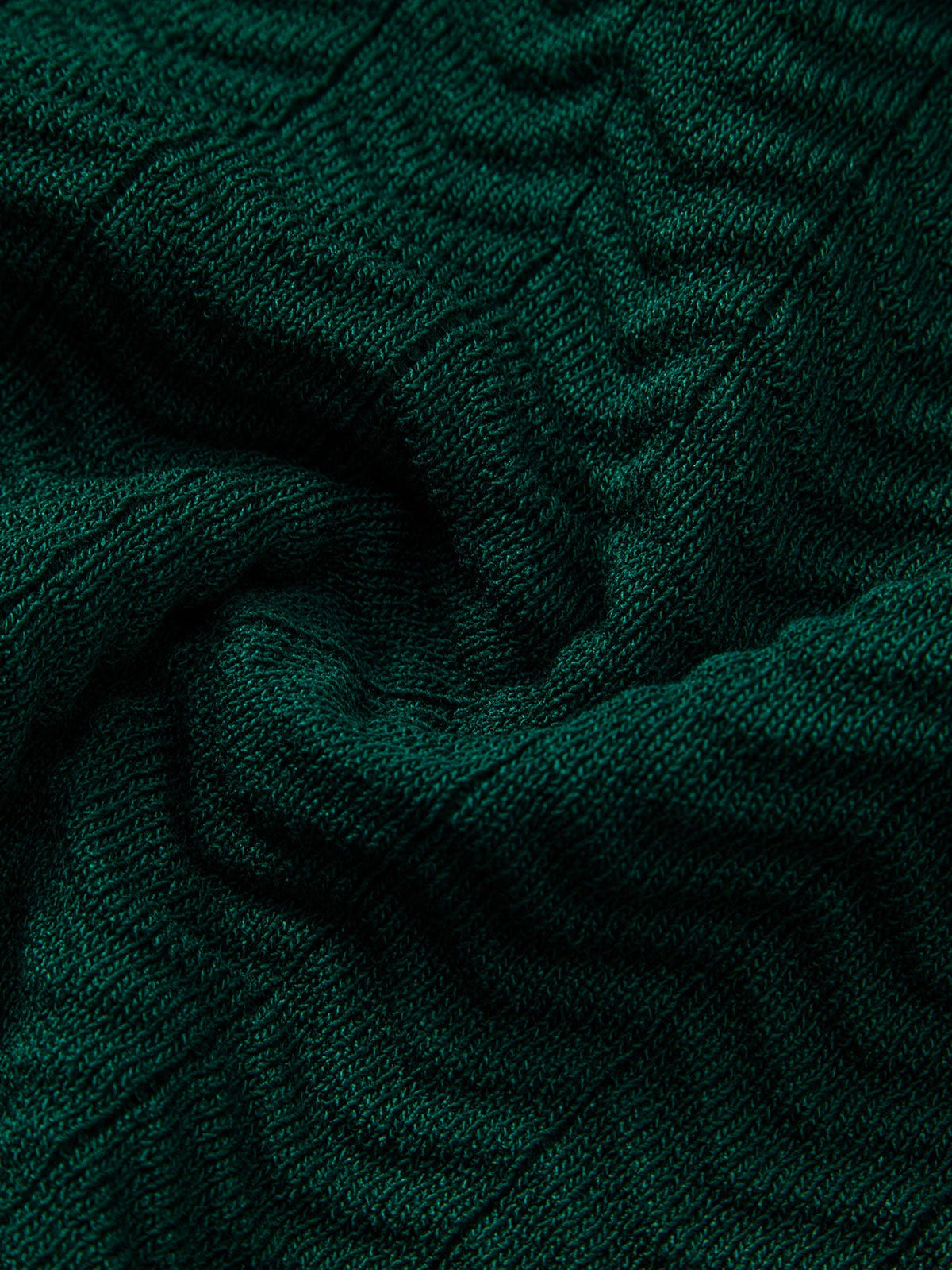 Polo de punto con cuello en V y contraste de textura