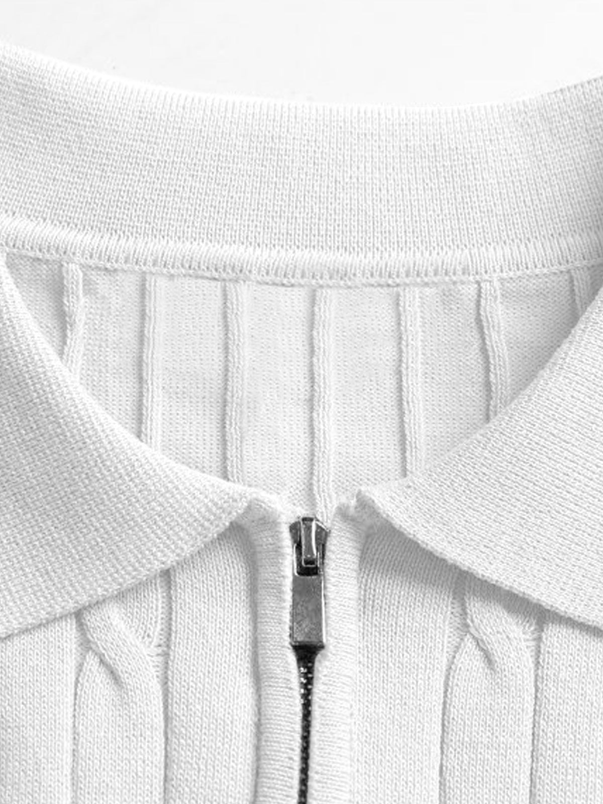 Polo de punto de jacquard retorcido con cremallera