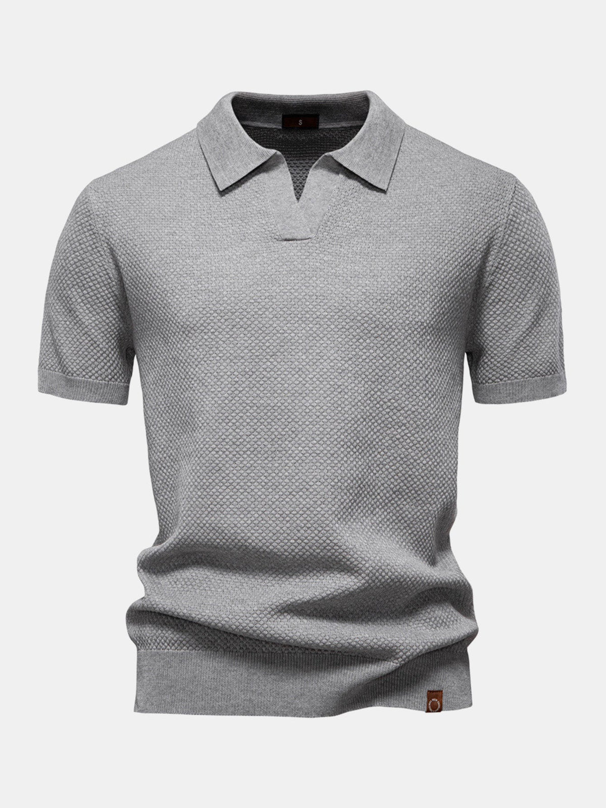 Polo de punto con textura de piña y cuello en V