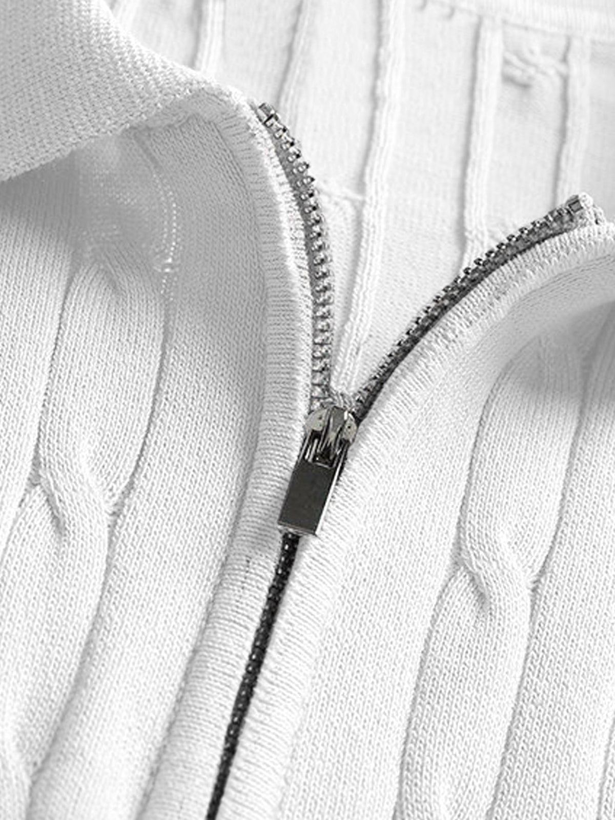 Polo de punto de jacquard retorcido con cremallera