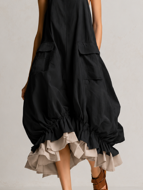Vestido midi globo negro sin mangas con bolsillos grandes y volantes en capas