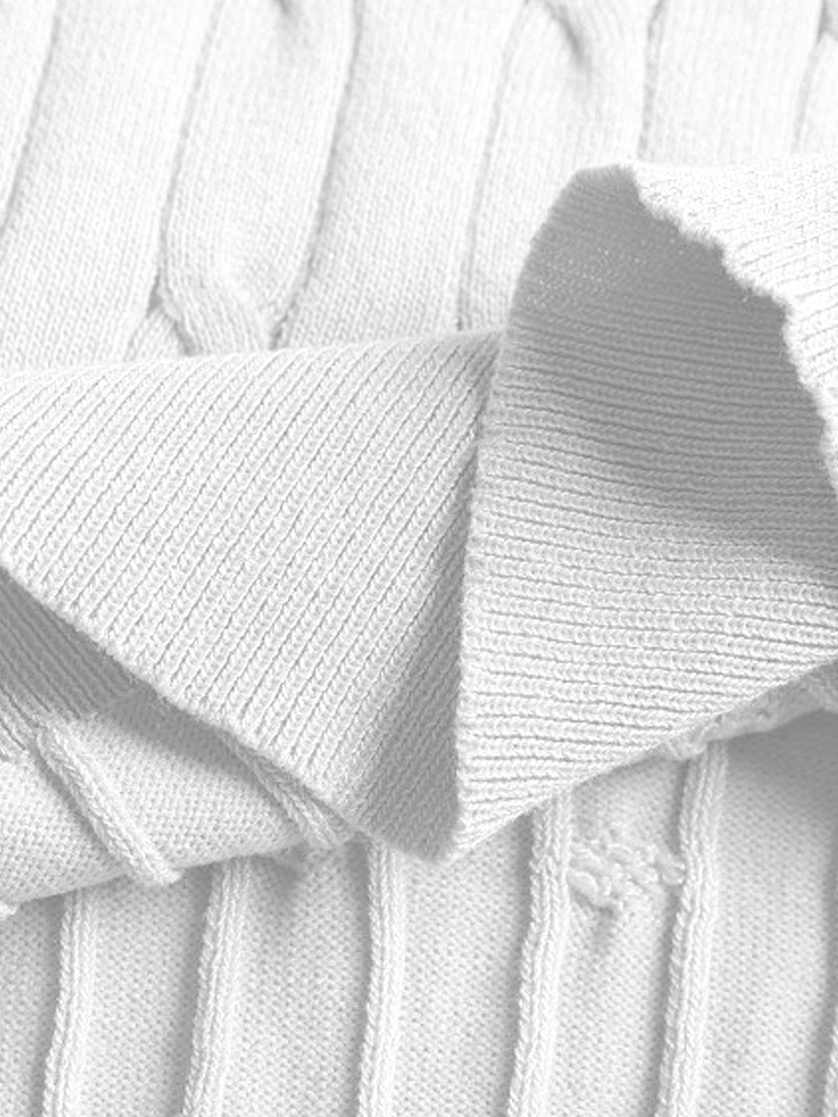 Polo de punto de jacquard retorcido con cremallera