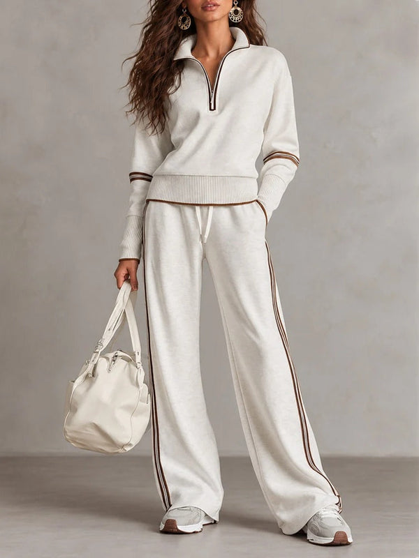Conjunto de sudadera acanalada blanca con media cremallera y pantalón ancho con bloques de color