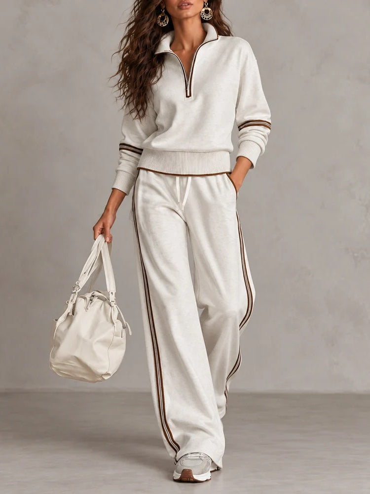 Conjunto de sudadera acanalada blanca con media cremallera y pantalón ancho con bloques de color