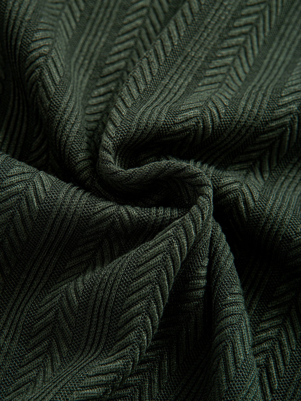 Polo con cremallera texturizada
