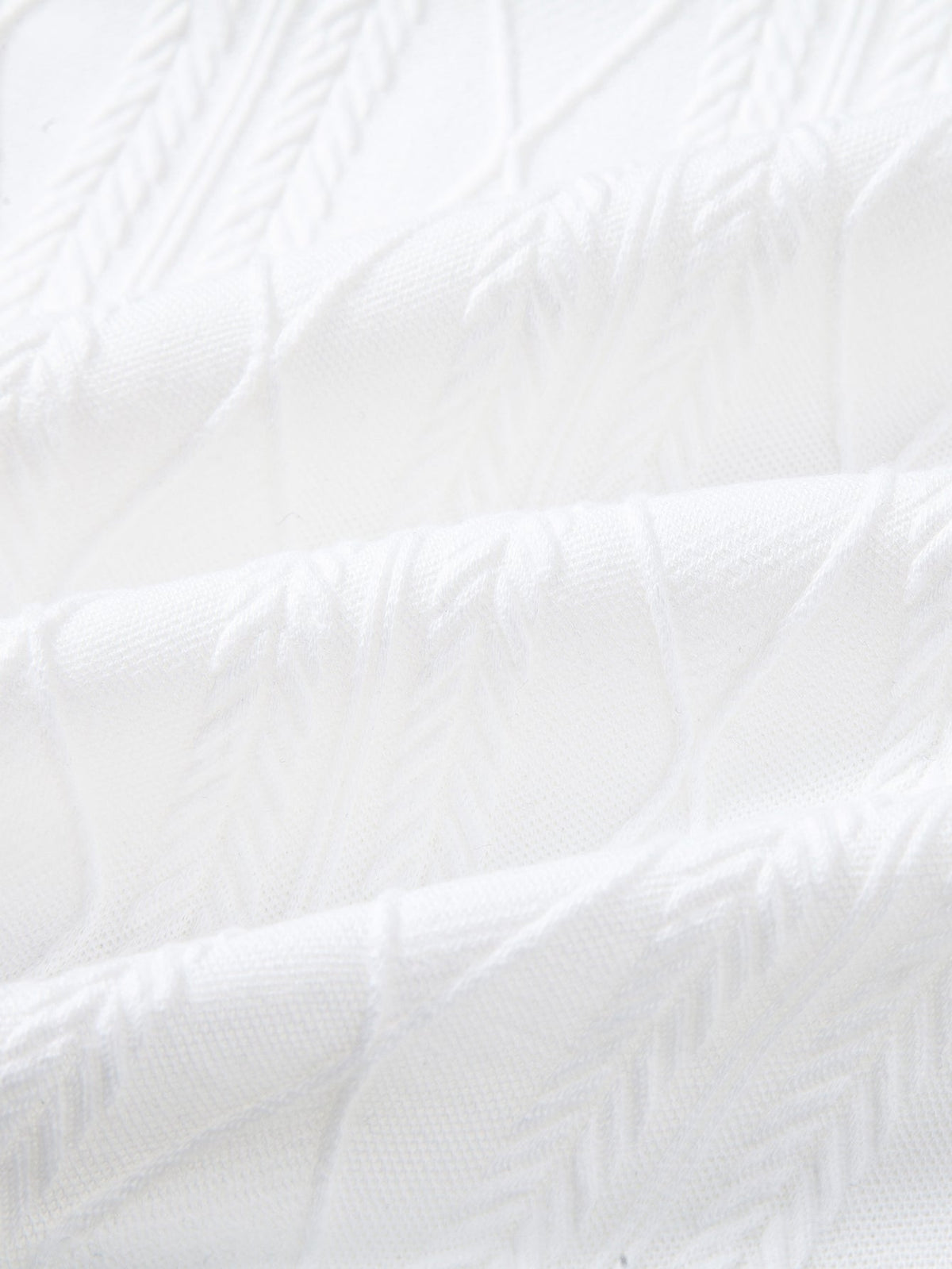 Polo de punto jacquard con geometría de contraste