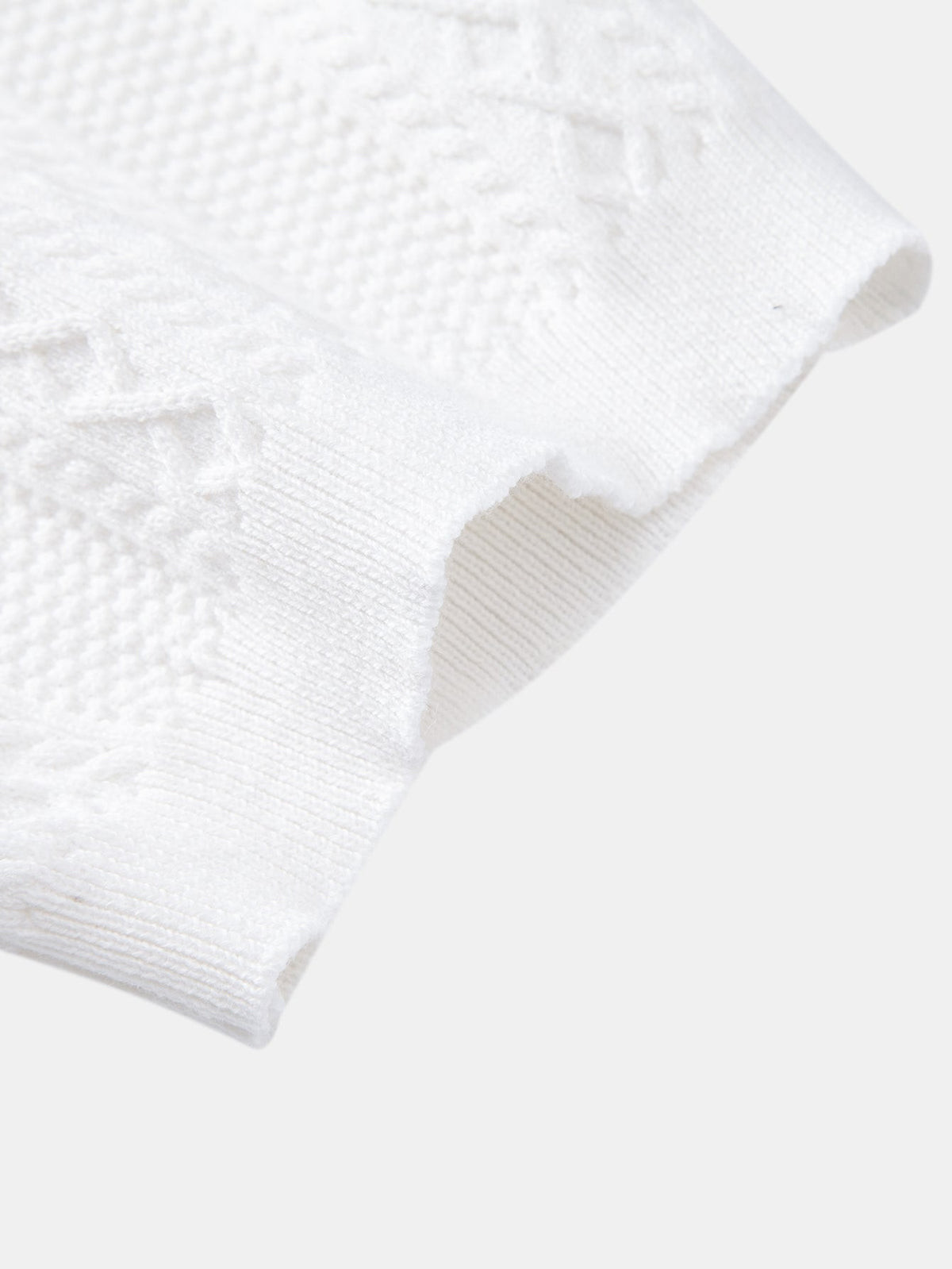 Polo de punto con jacquard geométrico