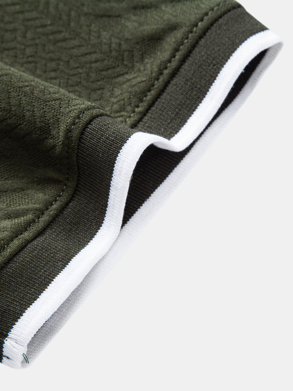Polo de jacquard geométrico con cremallera
