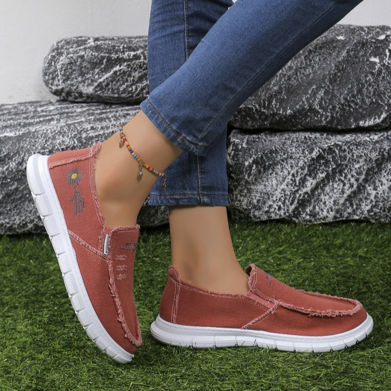 Mocasines de lona desgastada con bordado, sin cordones