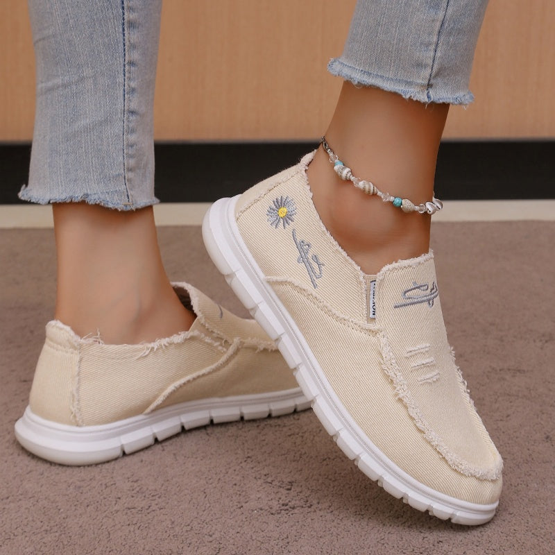 Mocasines de lona desgastada con bordado, sin cordones
