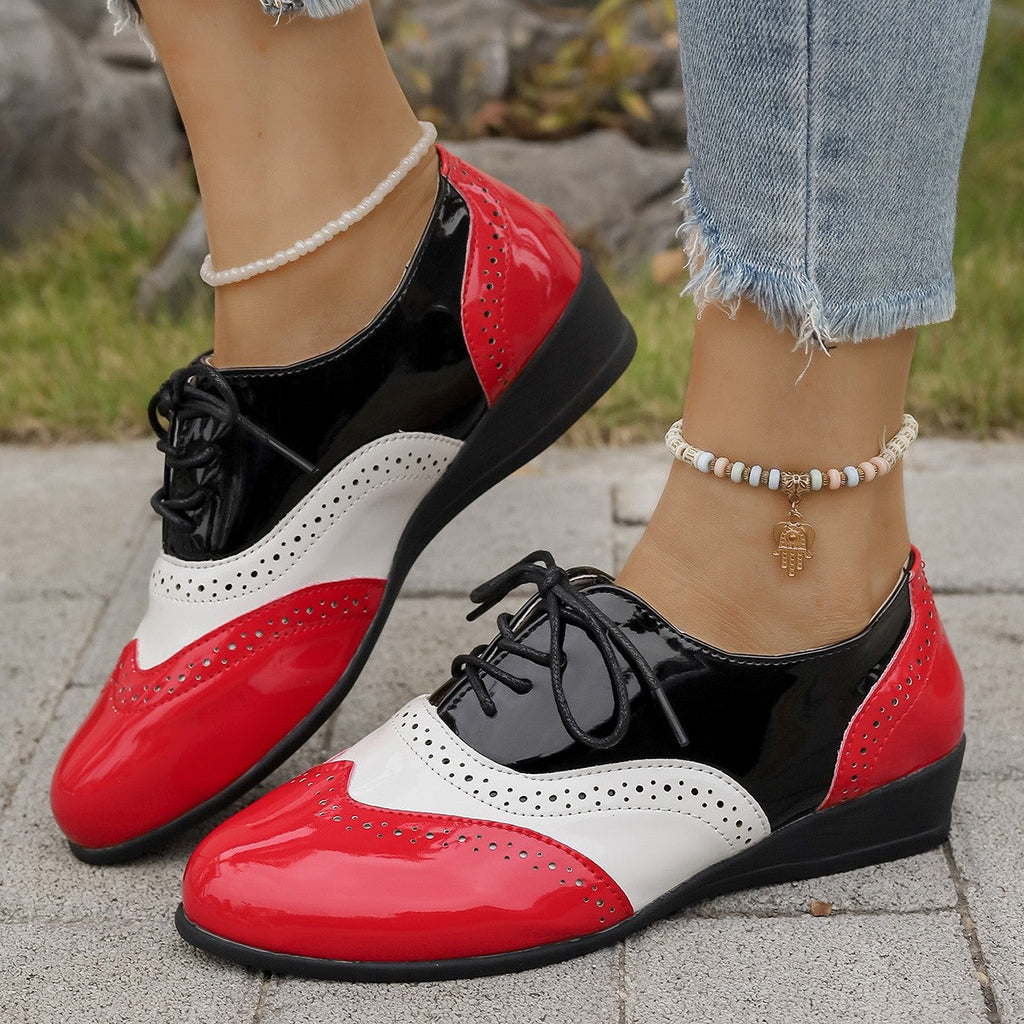 Zapatos Oxford bicolor estilo brogue con cuña baja