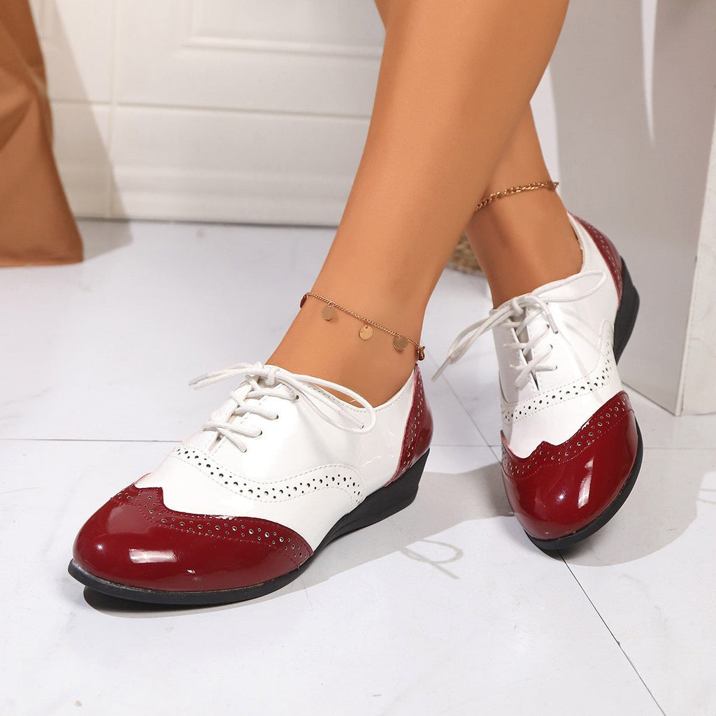 Zapatos Oxford bicolor estilo brogue con cuña baja