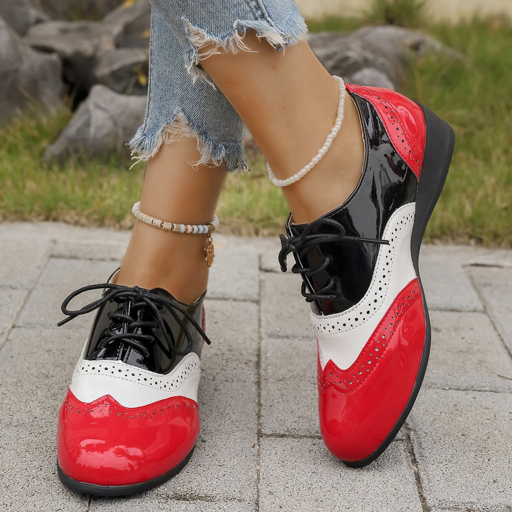 Zapatos Oxford bicolor estilo brogue con cuña baja
